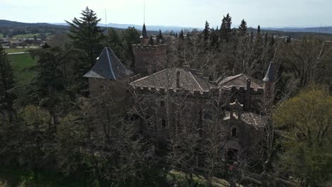 Aerial-orbit-over-Perafita's-Castle-in-Catalonia,-Spain