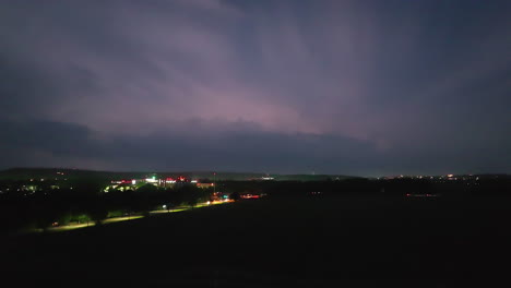 Lightning-illuminates-the-night-sky-over-Springdale,-Arkansas,-USA