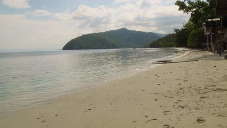 A-tranquil-beach-on-Kri-Island,-Raja-Ampat,-Indonesia