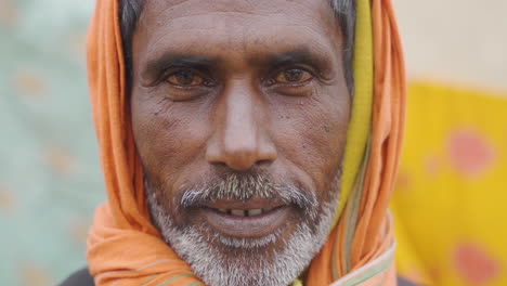 A-portrait-shot-of-a-60-years-old-Nepal-Terai-region-man-looking-at-the-camera-with-local-dress-at-Saptari