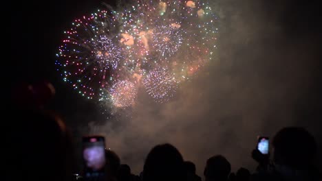 Stunning-cinematic-slow-motion-scenery-exploding-against-night-sky