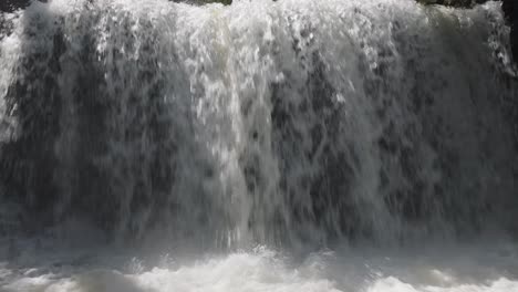 Rushing-waterfall-in-Owen-Sound,-Canada,-cascades-with-powerful-force