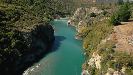 Aerial-view-over-calm-section-of-Kawarau-River,-Queenstown,-New-Zealand