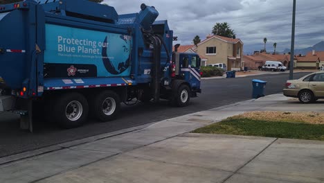 Trash-Truck-Collecting-Waste-From-Garbage-Cans-on-Street-in-Las-Vegas-Residential-Neighborhood