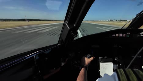 Pilot-inside-a-jet-cockpit-taking-off-from-Jerez-airport,-Spain