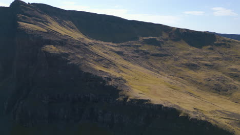 Aerial-flying-over-landscape-at-The-Storr,-Scotland