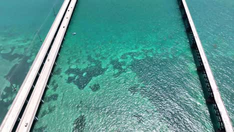 aerial-over-bridges-clear-water-and-coral-in-the-florida-keys