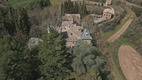 Aerial-drone-panoramic-fly-above-Perafita's-Castle-in-Catalonia,-Spain