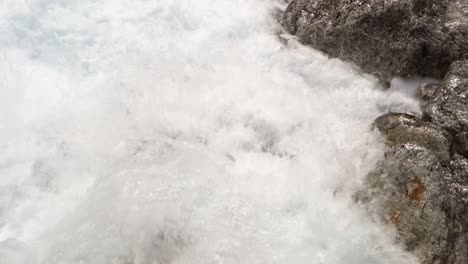 Fast-flowing-stream-of-water,-creek-in-spring-mountain-floods