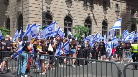 A-street-level-view-of-the-Israel-Day-Parade-in-New-York-City-on-a-sunny-day