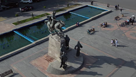 Aerial-orbits-equestrian-statue-in-Vardanants-Square,-Gyumri,-Armenia