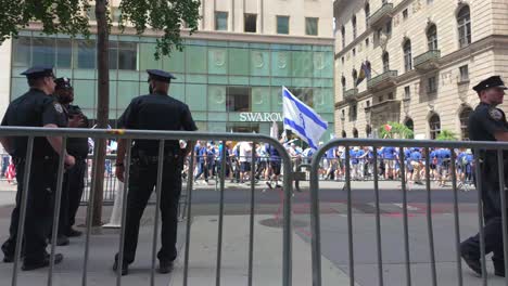 A-street-level-view-of-the-Israel-Day-Parade-in-New-York-City-on-a-sunny-day