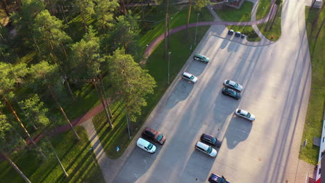 Parking-Lot-and-Trees-at-Janis-Dalins-Stadium-in-aerial-view,-Valmiera,-Latvia