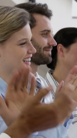 Business-man-and-woman-clapping-in-their-hands