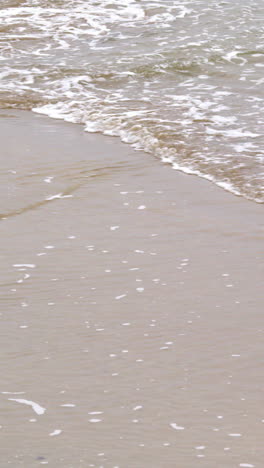 Ocean-rolling-in-over-the-sand