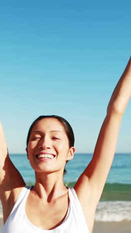 Woman-standing-with-arms-outstretched