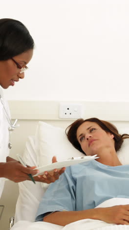 Nurse-checking-on-her-sick-patient