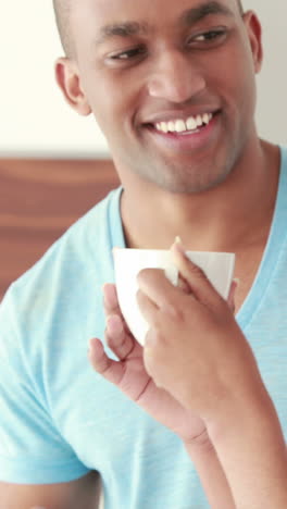 Smiling-couple-having-breakfast-together