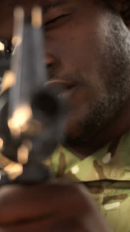 Portrait-of-military-soldier-aiming-with-machine-gun