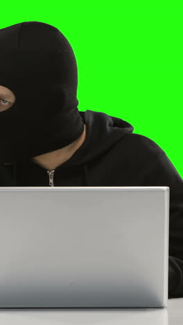 Computer-hacker-using-a-laptop