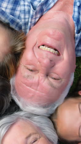 Extended-family-smiling-in-the-garden