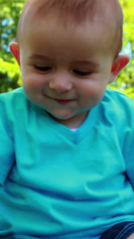 Cute-baby-boy-playing-with-sunhat