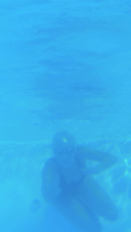 Low-angle-view-of-fit-swimmer-in-pool