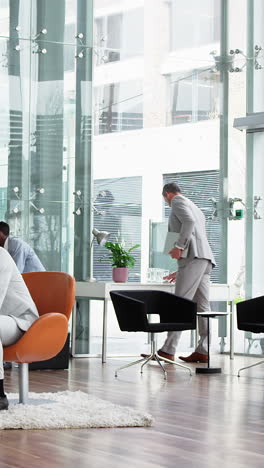 Businesspeople-walking-in-cafeteria