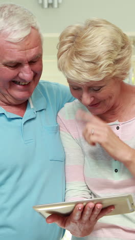 Senior-couple-using-tablet-pc