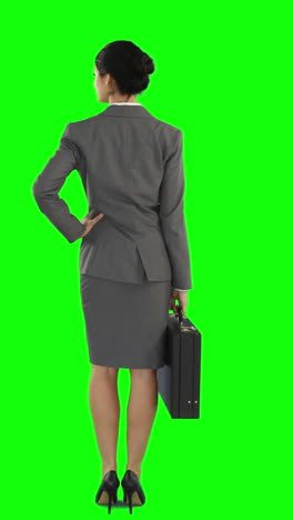 Business-woman-walking,-standing-and-looking-around-while-waiting