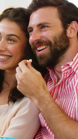 Couple-with-pop-corn-in-their-hands