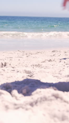 Family-running-on-the-beach