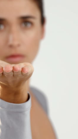 Woman-gesturing-on-white-background