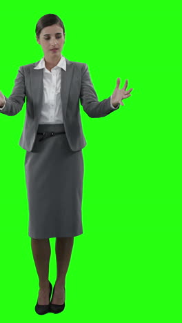 Businesswoman-gesturing-on-green-screen