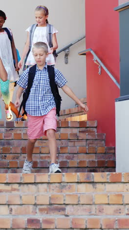 School-kids-walking-on-staircase