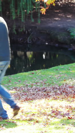 Parents-carrying-their-son-and-daughter-in-a-wheelbarrow