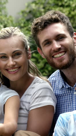 Smiling-family-posing-for-the-camera