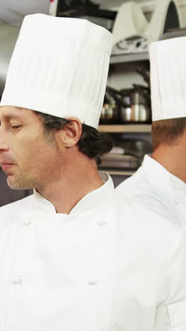 Group-of-chef-talking-and-smiling-at-camera