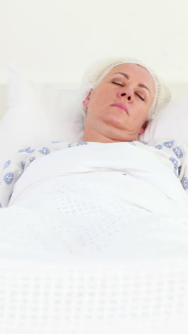 Patient-sleeping-on-medical-bed-