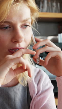 Woman-calling-with-her-smartphone-