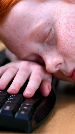 Little-girl-sleeping-on-keyboard