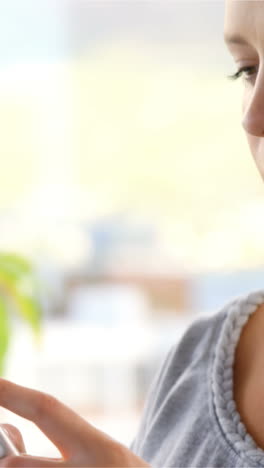 Patient-using-her-mobile-phone