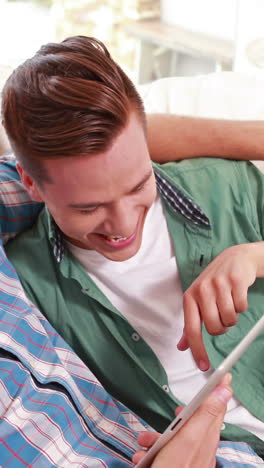 Two-homosexual-together-in-the-tablet-