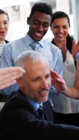 Group-of-Business-people-appreciating-their-colleagues-works