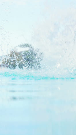 Businessman-jumping-in-the-swimming-pool