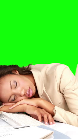 Businesswoman-sleeping-on-her-desk