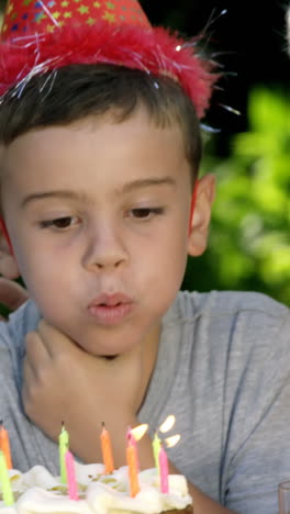 A-little-boy-blowing-out-the-candles