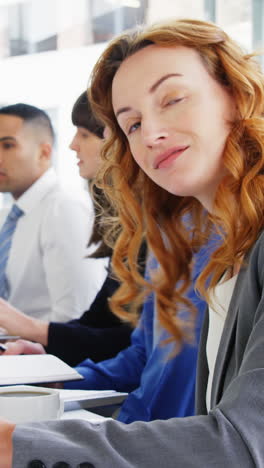 Businesspeople-in-meeting-at-conference-room