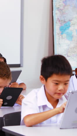 Students-using-digital-tablet-in-classroom