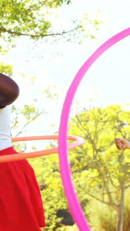 Group-of-kids-twirling-hula-hoop